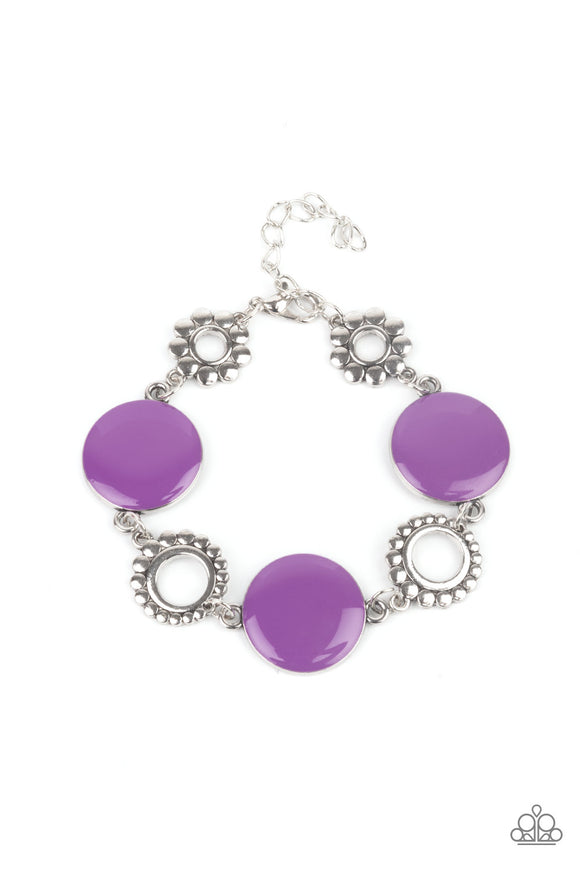 Featuring shiny Amethyst Orchid accents, studded silver circles and shimmery silver floral accents link around the wrist for a colorful display. Features an adjustable clasp closure.  Sold as one individual bracelet.