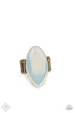 Featuring a dewy iridescence, an oversized white opal bead sits atop a sleek brass frame for an ethereally rustic fashion. Features a stretchy band for a flexible fit.  Sold as one individual ring.