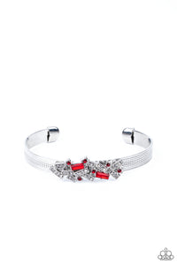 A jumble of dazzling red and white rectangle-shaped rhinestones mingle with small red sparkling rhinestones atop a modern stamped silver cuff.  Sold as one individual bracelet.