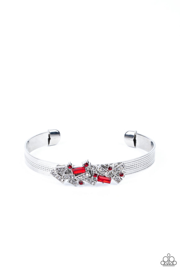 A jumble of dazzling red and white rectangle-shaped rhinestones mingle with small red sparkling rhinestones atop a modern stamped silver cuff.  Sold as one individual bracelet.