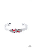 A jumble of dazzling red and white rectangle-shaped rhinestones mingle with small red sparkling rhinestones atop a modern stamped silver cuff.  Sold as one individual bracelet.