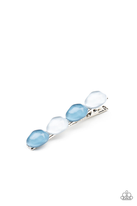 Featuring light-scattering refractions, asymmetrical French Blue and Cerulean glassy pebble-like beads adorn the front of a classic bobby pin.  Sold as one individual decorative bobby pin.