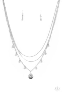 A petite silver disc engraved with the word "Mom," sweetly swings from the bottom of a silver chain accented with sparkly white rhinestones. Layers of silver satellite chain add charisma as they combine to fall below the collar for a timeless finish. Features an adjustable clasp closure.  Sold as one individual necklace. Includes one pair of matching earrings.