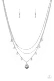 A petite silver disc engraved with the word "Mom," sweetly swings from the bottom of a silver chain accented with sparkly white rhinestones. Layers of silver satellite chain add charisma as they combine to fall below the collar for a timeless finish. Features an adjustable clasp closure.  Sold as one individual necklace. Includes one pair of matching earrings.