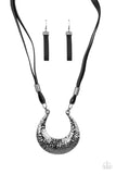 Infused with glistening gunmetal beads, strips of black leather link to an oversized half moon pendant that is hammered in a blinding gunmetal finish, creating an edgy statement piece below the collar. Features an adjustable clasp closure.  Sold as one individual necklace. Includes one pair of matching earrings.