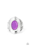 A dewy oval purple gem is pressed into the center of a textured silver frame, creating a raised centerpiece. Features a stretchy band for a flexible fit.  Sold as one individual ring.