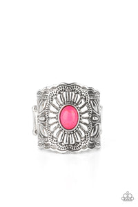 An exquisitely ornate silver band featuring engraved floral motifs is punctuated by a bright pink oval stone creating an elegant centerpiece atop the finger. Features a stretchy band for a flexible fit.  Sold as one individual ring.