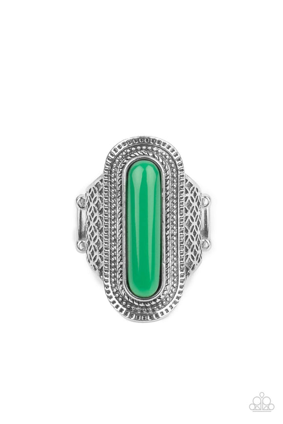 An oblong Mint bead adorns the center of an oval silver frame studded and stamped in tactile texture. The radiant frame attaches to a silver band embossed in antiqued floral-like details, creating a colorful centerpiece atop the finger. Features a stretchy band for a flexible fit.  Sold as one individual ring.