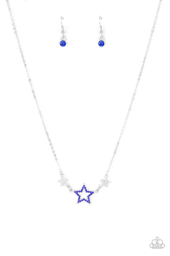 A blue rhinestone encrusted silver star is flanked by two dainty white rhinestone encrusted silver stars, creating a sparkly patriotic pendant below the collar. Features an adjustable clasp closure.  Sold as one individual necklace. Includes one pair of matching earrings.