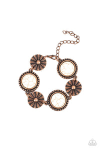 A rustic collection of floral embossed copper frames and copper studded white stone frames delicately connect around the wrist, creating a simply seasonal look. Features an adjustable clasp closure.  Sold as one individual bracelet.