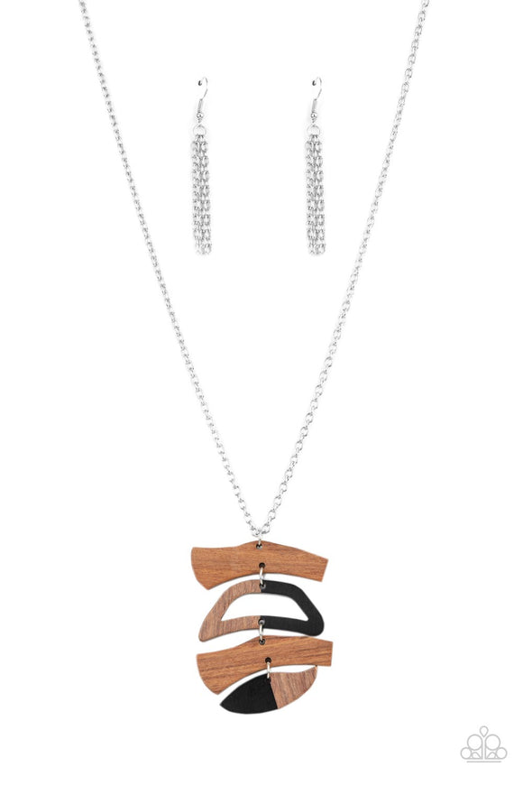Featuring black acrylic accents, mismatched wooden frames delicately link into a abstract pendant at the bottom of a lengthened silver chain for an earthy fashion. Features an adjustable clasp closure.  Sold as one individual necklace. Includes one pair of matching earrings.