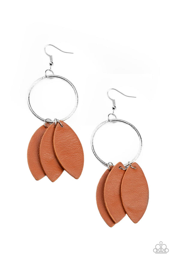 Leafy Adobe leather frames swing from the bottom of a textured silver hoop, creating an earthy fringe. Earring attaches to a standard fishhook fitting.  Sold as one pair of earrings.