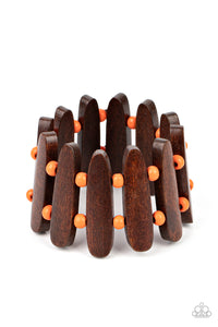 Pairs of Burnt Orange wooden beads and oblong brown wooden frames alternate along stretchy bands around the wrist for a seasonal pop of color.  Sold as one individual bracelet.