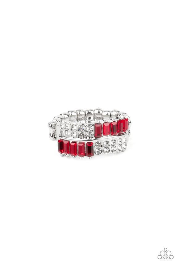 Stacks of dainty white and emerald cut red rhinestones connect across the finger, creating a glitzy checkered centerpiece atop the finger. Features a dainty stretchy band for a flexible fit.  Sold as one individual ring.