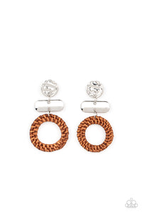 A brown wicker-like hoop swings from the bottom of mismatched stacked silver frames, creating an earthy display. Earring attaches to a standard post fitting.  Sold as one pair of post earrings.