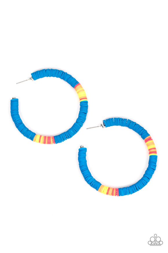 Rubbery blue, pink, yellow, and orange bands are threaded along an oversized silver hoop, creating a courageous pop of color. Earring attaches to a standard post fitting. Hoop measures approximately 2 1/4