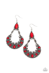 Dotted with red beads and dainty white rhinestones, a filigree filled silver wreath swings from the bottom of a matching red bead for a whimsical fashion. Earring attaches to a standard fishhook fitting.  Sold as one pair of earrings.