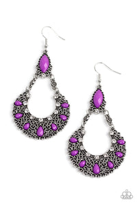 Dotted with purple beads and dainty white rhinestones, a filigree filled silver wreath swings from the bottom of a matching purple bead for a whimsical fashion. Earring attaches to a standard fishhook fitting.  Sold as one pair of earrings.