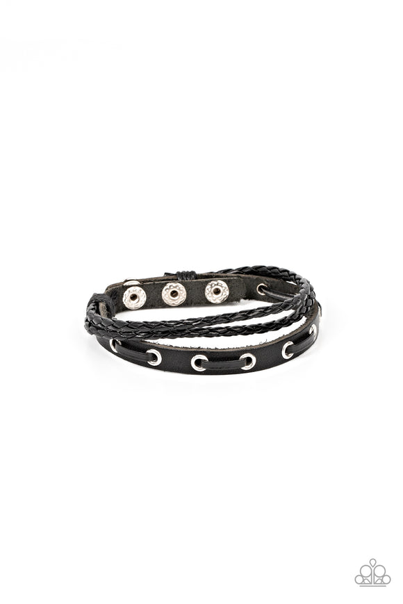Infused with black leather laces, a rustic piece of black leather joins a pair of braided leather cords around the wrist, stacking into an adventurous centerpiece. Features an adjustable snap closure.  Sold as one individual bracelet.