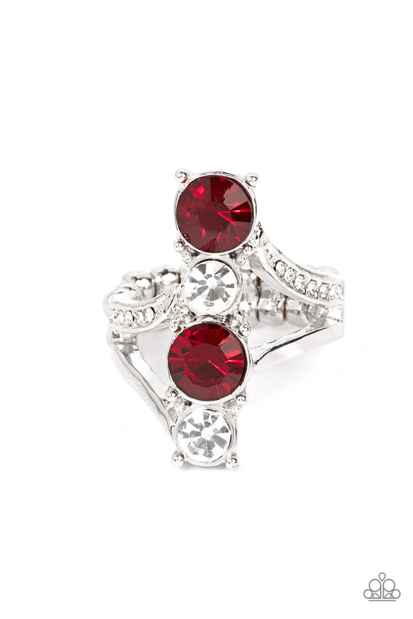 Attached to plain silver bands and white rhinestone encrusted silver bands, pairs of white and red rhinestones duplicate down the finger for a dazzling finish. Features a dainty stretchy band for a flexible fit.  Sold as one individual ring.