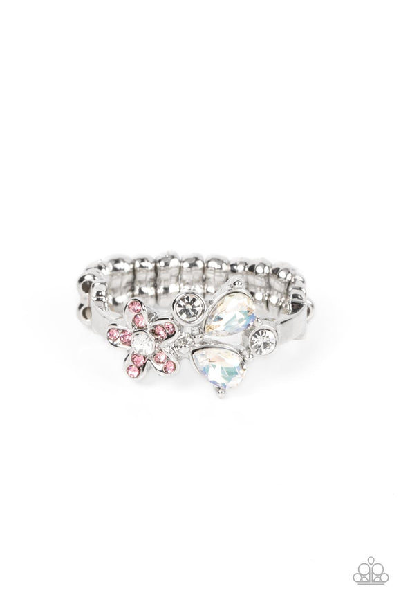 A pink rhinestone dotted floral frame joins round and teardrop white rhinestones atop a dainty silver band, blooming into an enchanting centerpiece across the finger. Features a dainty stretchy band for a flexible fit.  Sold as one individual ring.