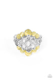 A white rhinestone dotted silver flower blooms atop bubbly yellow cat's eye stone borders, coalescing into an effervescent sparkle atop the finger. Features a stretchy band for a flexible fit.  Sold as one individual ring.