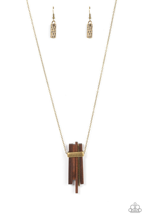 Banded together with a bold brass fitting, a collection of rectangular wooden frames join a hammered brass plate along an extended brass chain for an earthy twist. Features an adjustable clasp closure.  Sold as one individual necklace. Includes one pair of matching earrings.