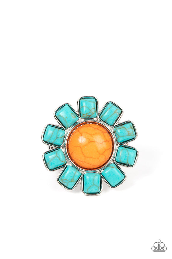 Square cut turquoise stones fan out from an oversized orange stone center, blooming into an artisan inspired blossom atop the finger. Features a stretchy band for a flexible fit.  Sold as one individual ring.