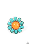 Square cut turquoise stones fan out from an oversized orange stone center, blooming into an artisan inspired blossom atop the finger. Features a stretchy band for a flexible fit.  Sold as one individual ring.