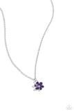 Painted in a plum finish, hammered silver petals delicately curl around a studded silver center at the bottom of a dainty silver chain for a rustically romantic finish. Features an adjustable clasp closure.  Sold as one individual necklace. Includes one pair of matching earrings.