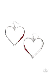 A section of fiery red rhinestones adorns a curvaceous silver heart frame, resulting in a heart-stopping sparkle. Earring attaches to a standard fishhook fitting.  Sold as one pair of earrings.