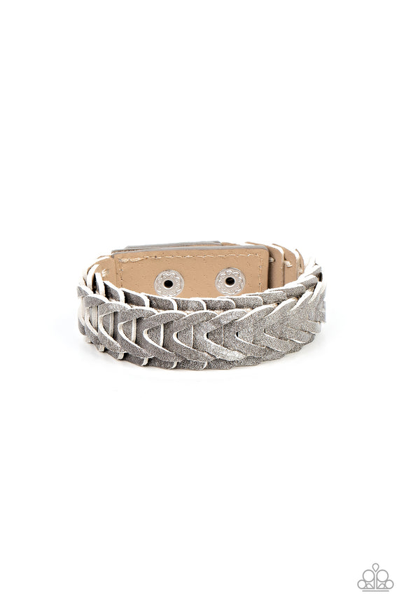 Overlapping gray leather frames delicately interlock into a rustic pattern around the wrist for a seasonal fashion. Features an adjustable snap closure.  Sold as one individual bracelet.