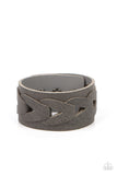 Featuring airy triangular cutouts, gray leather links interlock across the center of a distressed gray leather band for a rustic flair. Features an adjustable snap closure.  Sold as one individual bracelet.