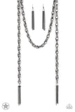 A single strand of spiraling, interlocking links with light-catching texture is anchored by two tassels of chain that add dramatic length to the piece. Undeniably the most versatile piece in Paparazzi's history, the scarf necklace features FIVE different ways to accessorize: Open Layer, Loop, Traditional Wrap, Double Knot, and Nautical Knot.  Sold as one individual necklace. Includes one pair of matching earrings