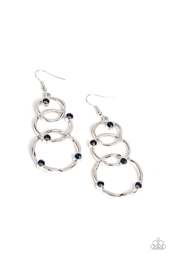 A sprinkling of glittery blue rhinestones floats across a trio of wavy silver circles that graduate in size as they interlock into a glamorously luminous lure. Earring attaches to a standard fishhook fitting.  Sold as one pair of earrings.