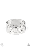 A wide silver band, hammered with subtle texture, is sprinkled with a constellation of embossed silver stars and sparkling dainty white rhinestones, creating a heavenly display around the wrist. Features a hinged closure.  Sold as one individual bracelet.