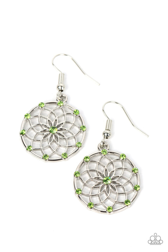 Dotted with dainty green rhinestones, an airy mandala-like blossom blooms inside a silver hoop for a seasonal shimmer. Earring attaches to a standard fishhook fitting.  Sold as one pair of earrings.