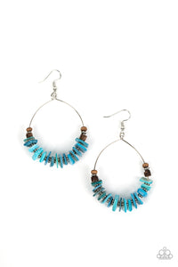 Infused with earthy wooden accents, studded silver rings and pieces of blue shell-like pebbles alternate along a dainty wire hoop for a tropical inspiration. Earring attaches to a standard fishhook fitting.  Sold as one pair of earrings.