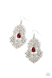 A sparkly red rhinestone swings from the top of a glittery explosion of white rhinestones that delicately scatter and curl into ribbons, coalescing into an effervescent chandelier. Earring attaches to a standard fishhook fitting.  Sold as one pair of earrings.