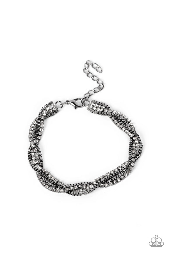 Glittery strands of dainty white rhinestones and glistening gunmetal box chain weave around the wrist, resulting in an irresistible sparkle. Features an adjustable clasp closure.  Sold as one individual bracelet.