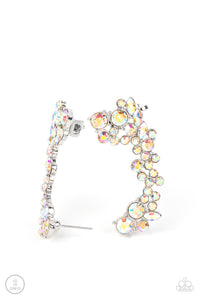 A sparkly collision of round and marquise cut iridescent rhinestones tumble down the ear, coalescing into an out-of-this-world sparkle. Features a clip-on fitting at the top for a secure fit. Due to its prismatic palette, color may vary.  Sold as one pair of ear crawlers.