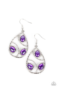 Featuring a glassy finish, glimmering purple teardrop beads adorn the center of an airy silver teardrop frame. Hammered in shimmer, arcing silver bars curve inside the frame for an abstract finish. Earring attaches to a standard fishhook fitting.  Sold as one pair of earrings.