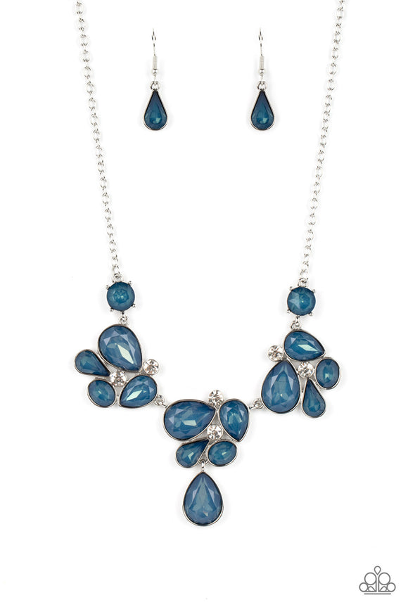 Draped elegantly across the chest, clusters of geometric blue gems, brushed in the fall Pantone® of Midnight, gather around sparkling white rhinestones, creating a bright and beautiful pattern. Features an adjustable clasp closure.  Sold as one individual necklace. Includes one pair of matching earrings.