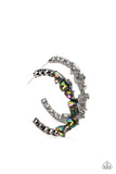 Flanked by hematite rhinestones, a collection of geometric rhinestones with an oil-spill finish sleekly curve around the ear, creating a trendy, yet nostalgic display. Due to its prismatic palette, color may vary. Earring attaches to a standard post fitting. Hoop measures approximately 2" in diameter.  Sold as one pair of hoop earrings.