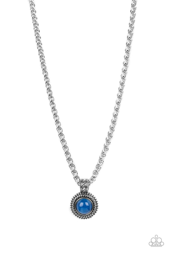 A textured silver frame spins around a lapis stone center, creating a tranquil statement piece. The reflective pendant is anchored by a textured silver fixture, adding eye-catching dimension as the pendant slides along a thick strand of silver wheat chain. Features an adjustable clasp closure. As the stone elements in this piece are natural, some color variation is normal.  Sold as one individual necklace.