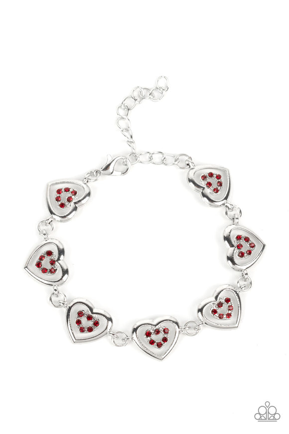 Dotted with dainty siam rhinestones, airy silver heart silhouettes are affixed to the points of larger silver heart frames. The two dimensional heart frames link together around the wrist in a flirtatious finish. Features an adjustable clasp closure.  Sold as one individual bracelet.