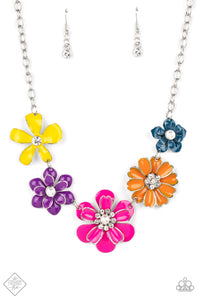 A row of colorful flowers blooms to life along the collar, creating a vibrant statement piece. Each flower features a different centerpiece, flawlessly sprinkling the design with whimsical sparkle and shimmery pearls. Silver edging outlines some of the layered petals, emphasizing the handcrafted character of the design. Features an adjustable clasp closure.  Sold as one individual necklace. Includes one pair of matching earrings.