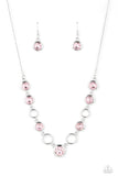 Thick airy silver hoops interlock with round brilliant-cut pink rhinestones set in similar thick frames for an unmatched elegant sparkle. Features an adjustable clasp closure.  Sold as one individual necklace. Includes one pair of matching earrings.