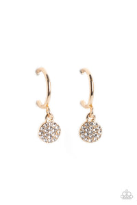 Swinging from a glistening gold hoop, a dainty gold disc, embossed with white rhinestones glimmers, adding a subtle shimmer around the ear. Earring attaches to a standard post fitting. Hoop measures approximately 1/2" in diameter.  Sold as one pair of hoop earrings.