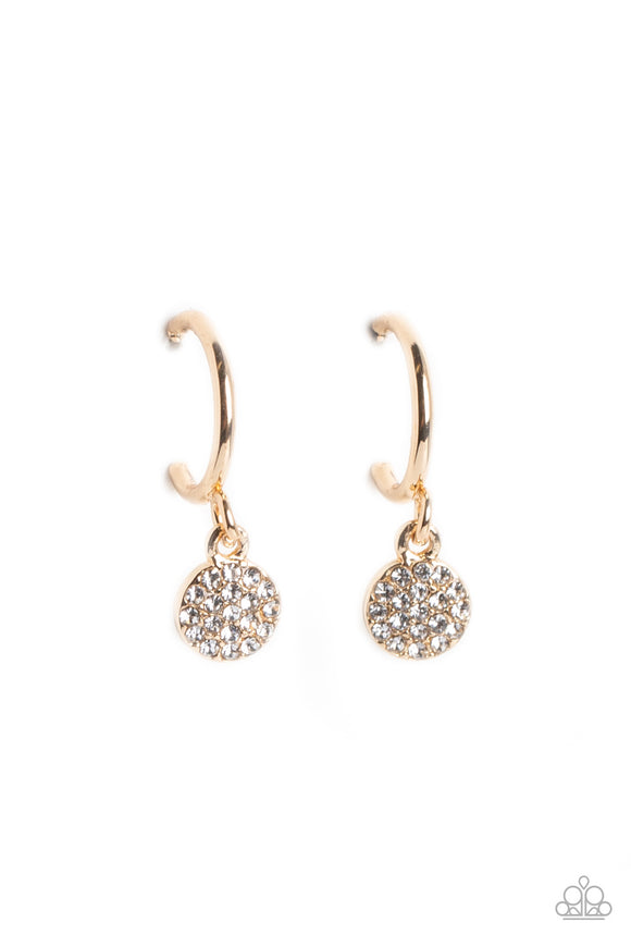 Swinging from a glistening gold hoop, a dainty gold disc, embossed with white rhinestones glimmers, adding a subtle shimmer around the ear. Earring attaches to a standard post fitting. Hoop measures approximately 1/2